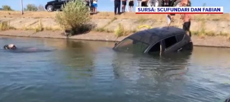 O femeie din Maramureș a rămas fără mașină, după ce fostul soț i-a scufundat autoturismul într-un lac